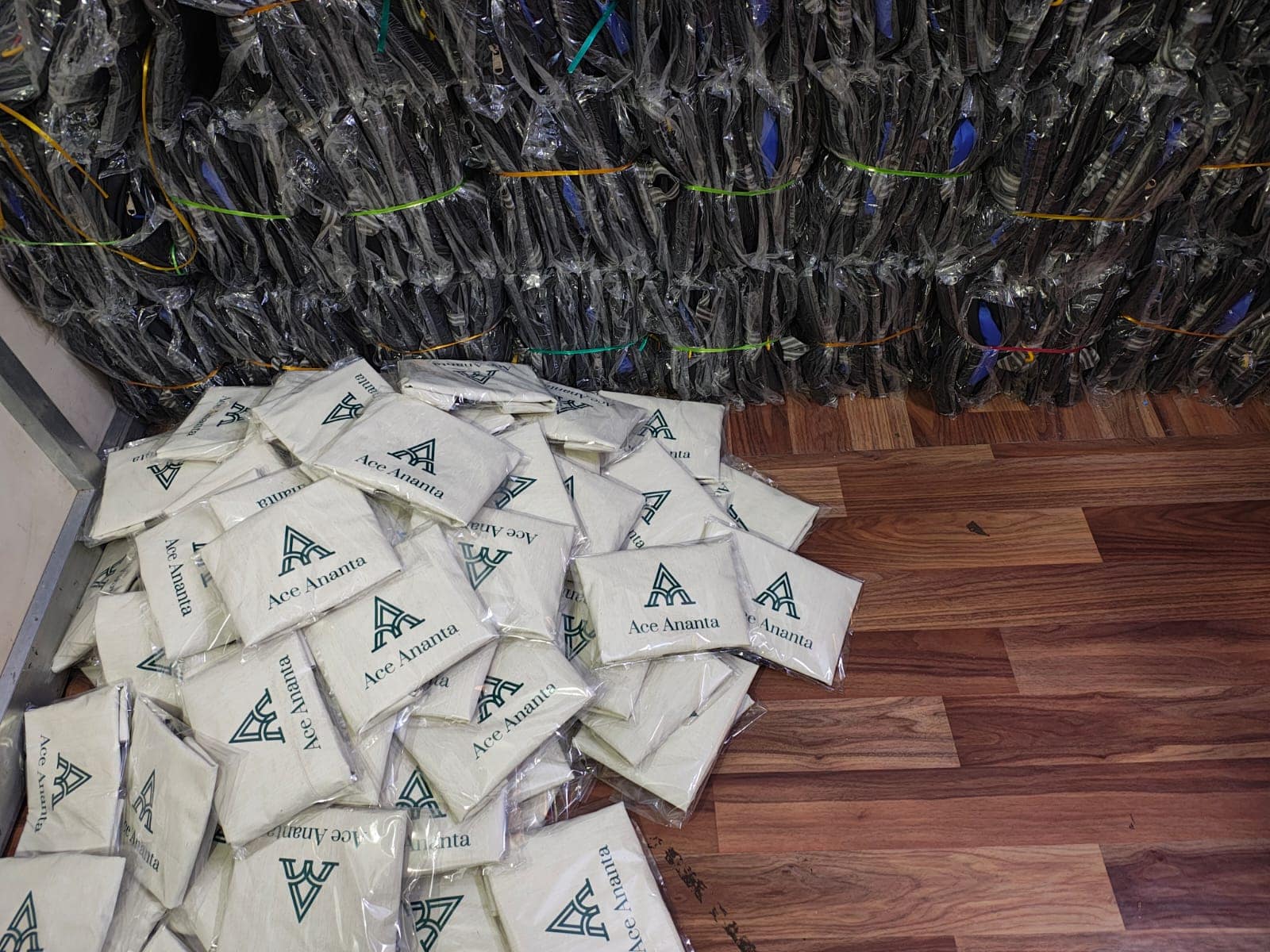 Branded corporate gifting bags packed and stacked for dispatch at the ABM Bags workshop