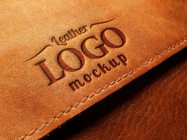 A placeholder logo embossed into tan leather beside a stitched edge, shown as a mockup