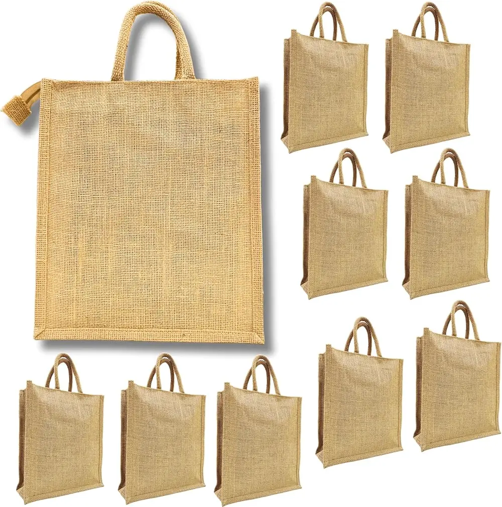 Ten plain jute tote bags with rope handles and gusseted bases, arranged to show the size range